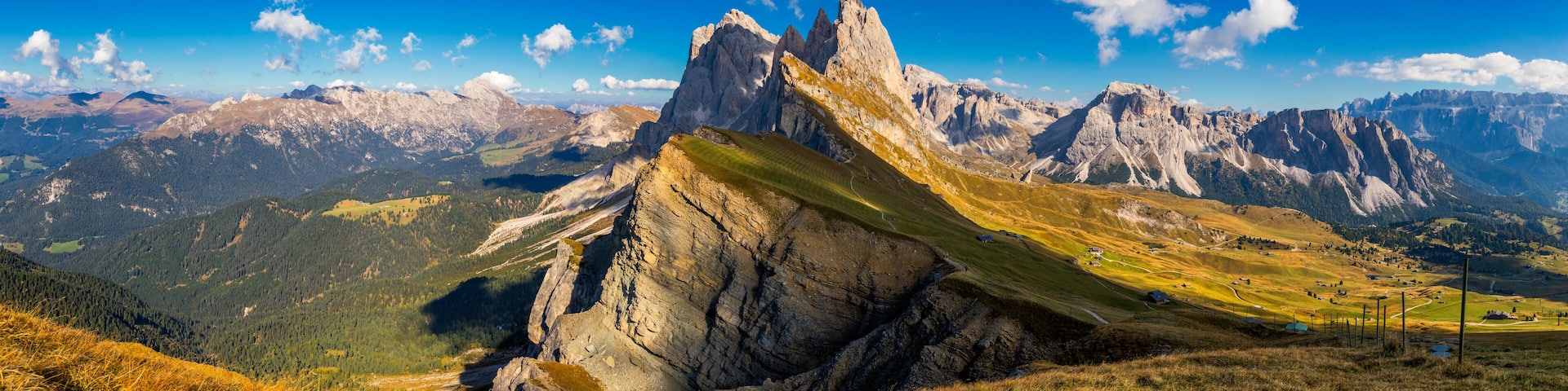 Panorama on Seceda peaks. Trentino Alto Adige, Dolomites Alps, South Tyrol, Italy. Odle mountain range, Val Gardena. Majestic Furchetta peak. Odles group seen from Seceda, Santa Cristina Val Gardena.