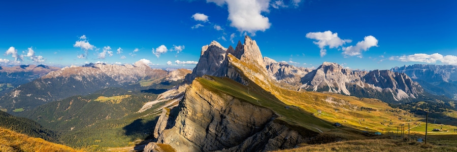 Panorama on Seceda peaks. Trentino Alto Adige, Dolomites Alps, South Tyrol, Italy. Odle mountain range, Val Gardena. Majestic Furchetta peak. Odles group seen from Seceda, Santa Cristina Val Gardena.