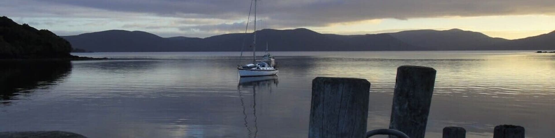 Stewart Island is the New Zealand island south of the South Island. The only town, Oban has a small population, but the majority of the island is very seldom visited.  Some parts are reachable by hiking trail while others like the bay in the south are only reachable by boat.