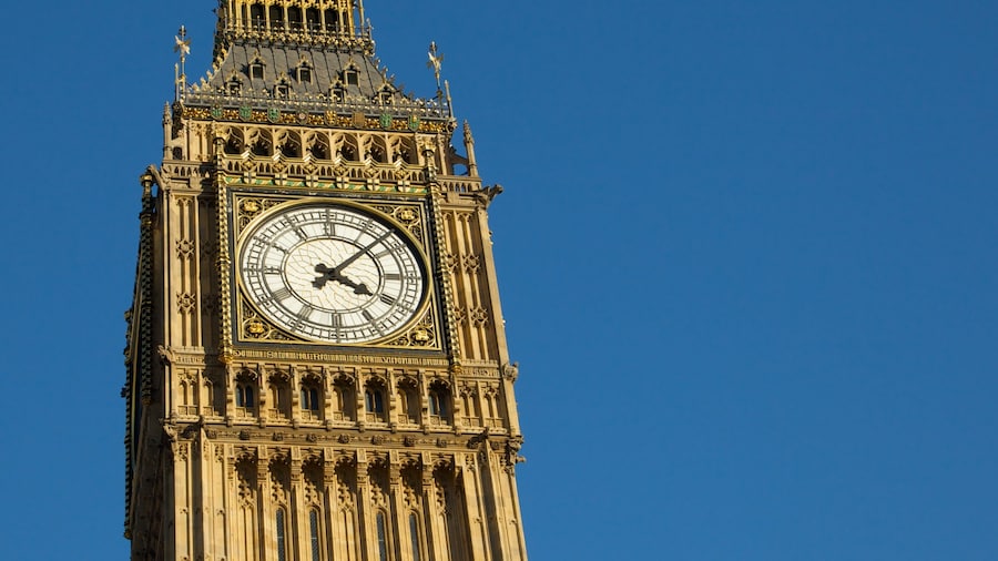 Big Ben stands tall against a clear blue sky in London, capturing the essence of British architecture and history