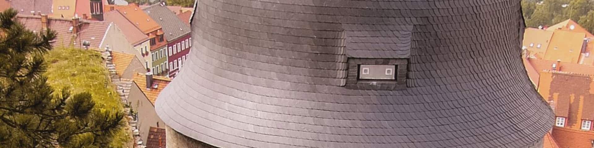 "Burg Stolpen" is a castle built on top of the Schloßberg in the historical town of Stolpen.