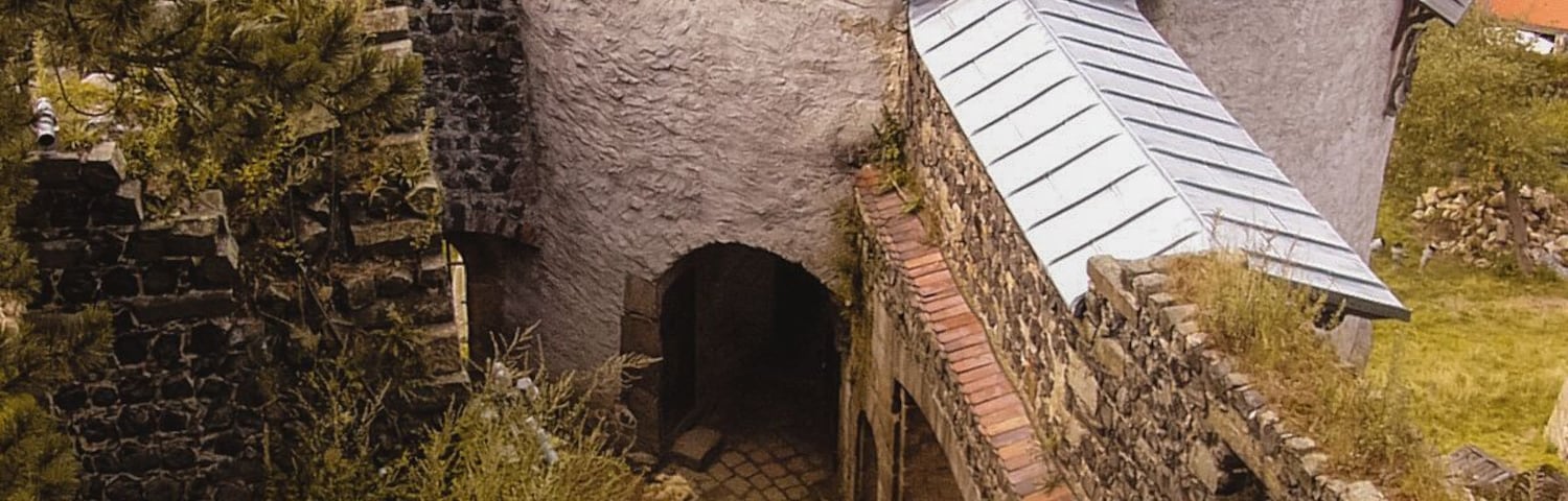 "Burg Stolpen" is a castle built on top of the SchloĂberg in the historical town of Stolpen.