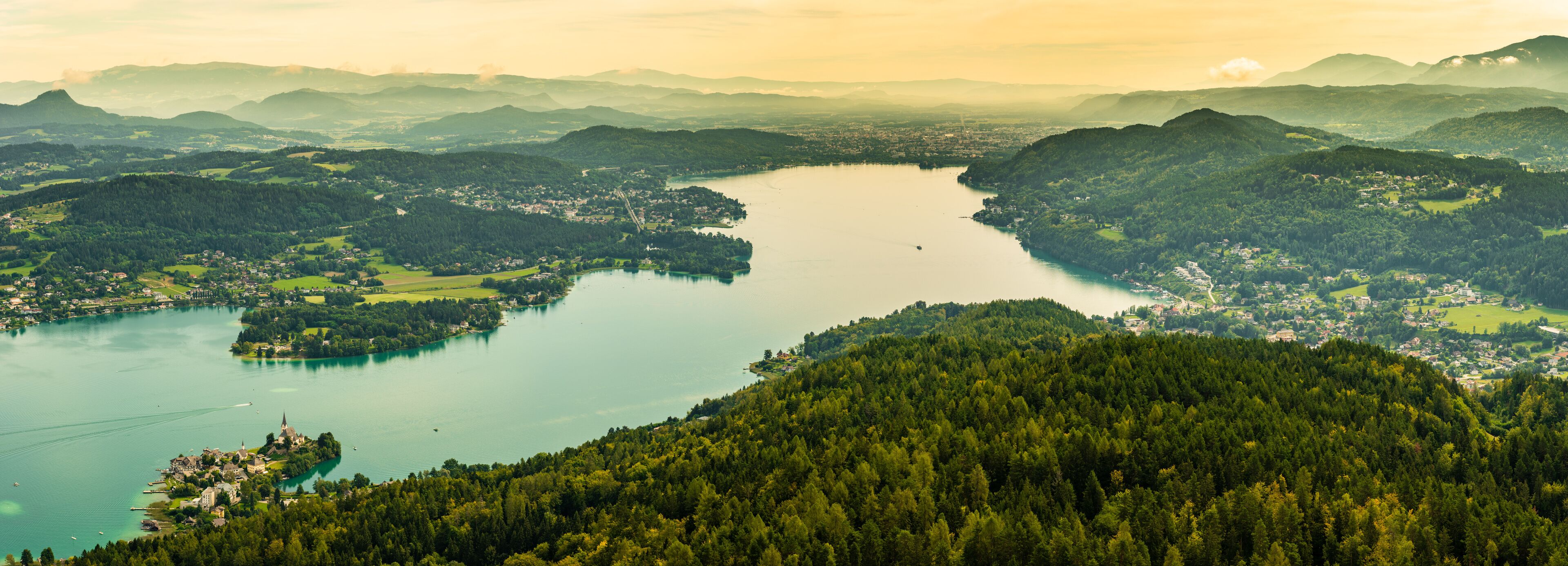Panorama of Lake Worthersee and Klagenfurt city