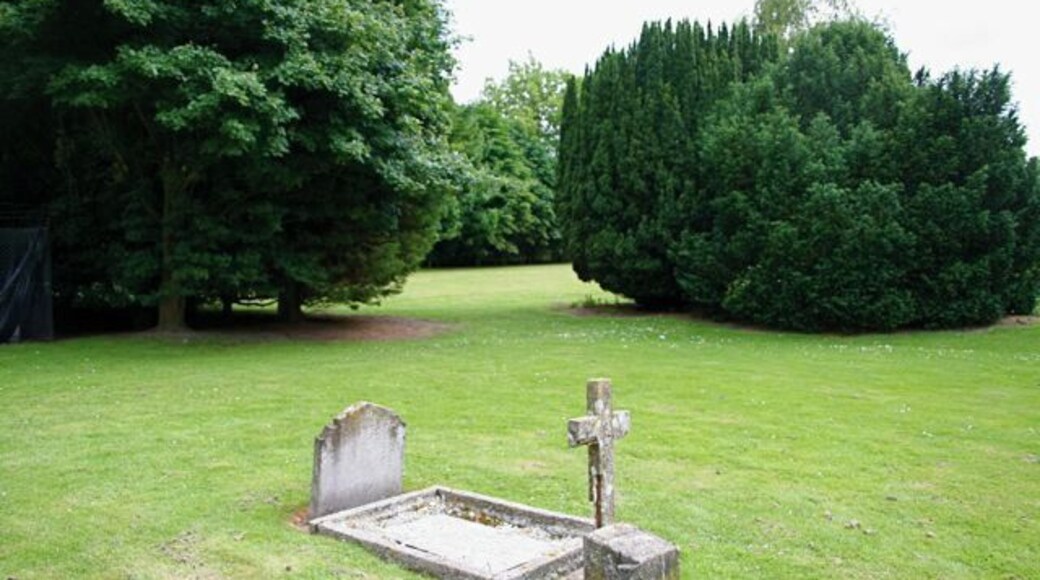 Solitary grave stone in a park The inscription says, "In memory of the patients of Fulbourn Hospital buried in this cemetery 1862-1953. May They Rest In Peace. This stone marks the site of the hospital cemetery chapel dedicated and consecrated by the Bishop of Ely on June 24th 1862."