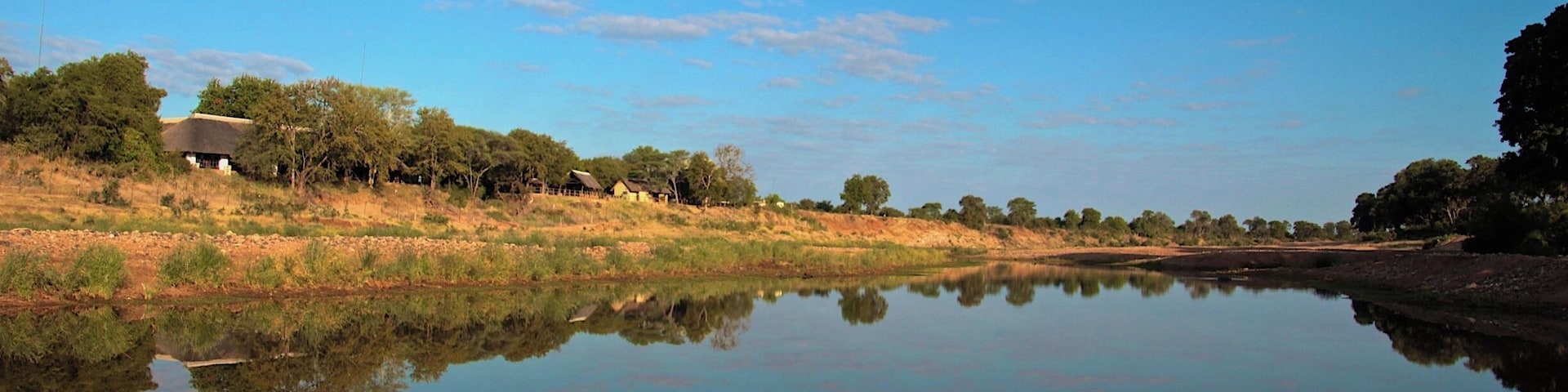 Shingwedzi Rest Camp is one of the SANParks restcamps in the Kruger National Park in South Africa. It's located in the northern part of the park, along the Shingwedzi river. It's stunning to sit on the terrace with a sundowner enjoying stunning sunsets while looking at the animals soaking up the last rays of sun. More information about the northern part of Kruger in this blog post --> http://www.thetravellingchilli.com/2015/06/kruger-national-park-6-breathtaking-highlights-from-the-north/