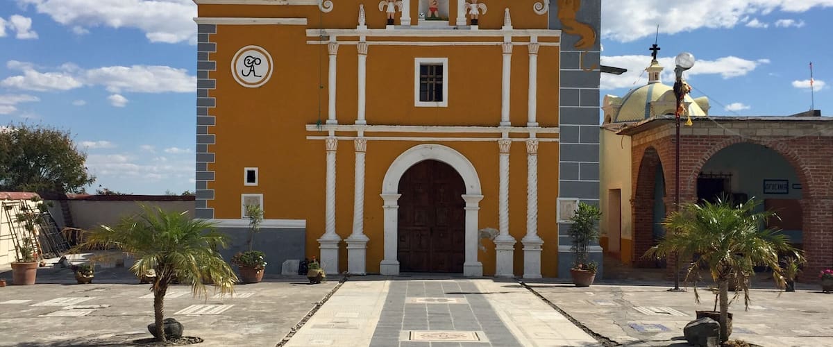 It was a beautiful day to walk around this small town. It eventually led me here to this colorful church. #Mexico #Puebla #Coyula #ColorfulChurches