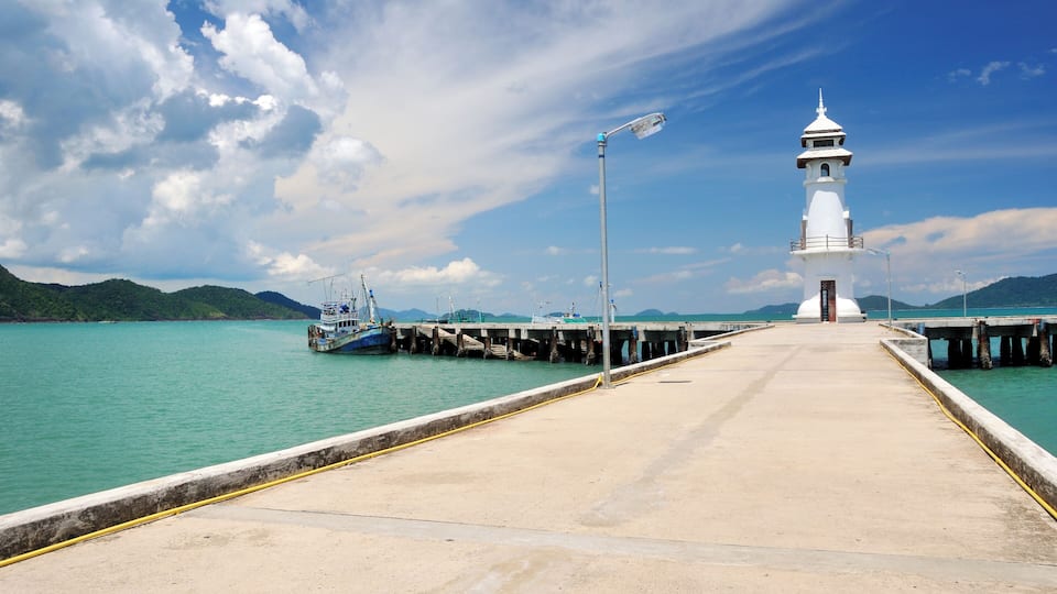 Dock with lighttower in the famous tourist village Bangbao in Thailand (Koh Chang)