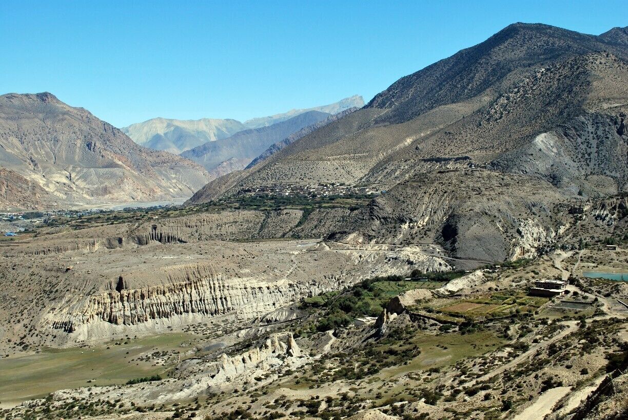 Looking back along our first day trekking route: from the Jomson airport on the left to the little blue lake on the right.