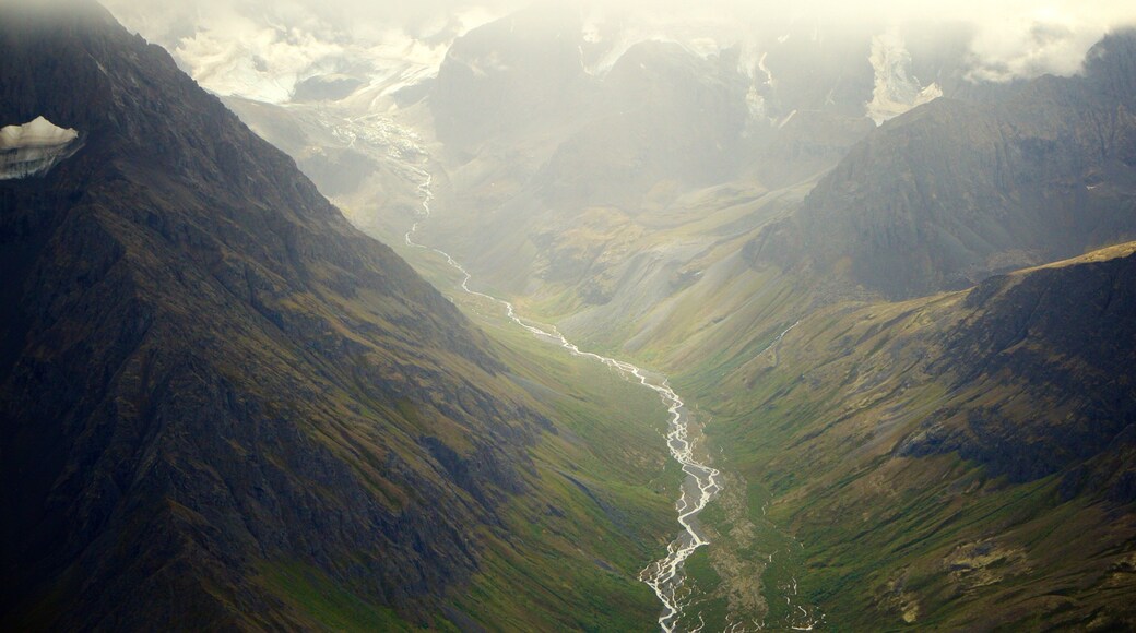Chugach State Park showing a gorge or canyon, mountains and a river or creek