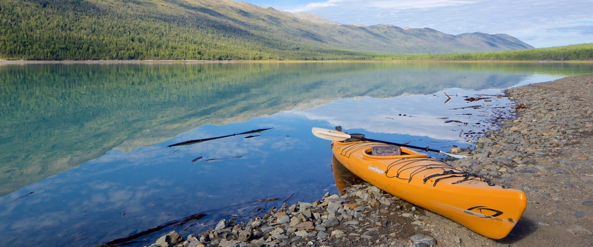 Eklutna Lake featuring kayaking or canoeing and a lake or waterhole