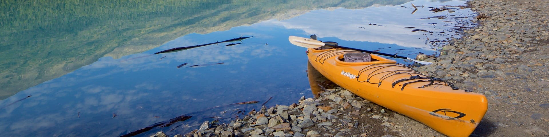 Eklutna Lake featuring a lake or waterhole and kayaking or canoeing
