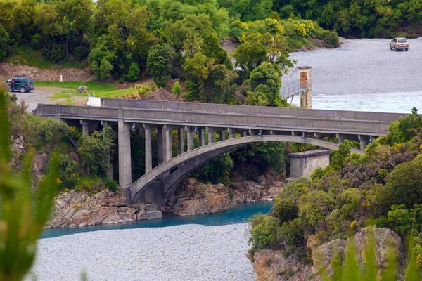 Rakaia Gorge featuring a bridge and a river or creek