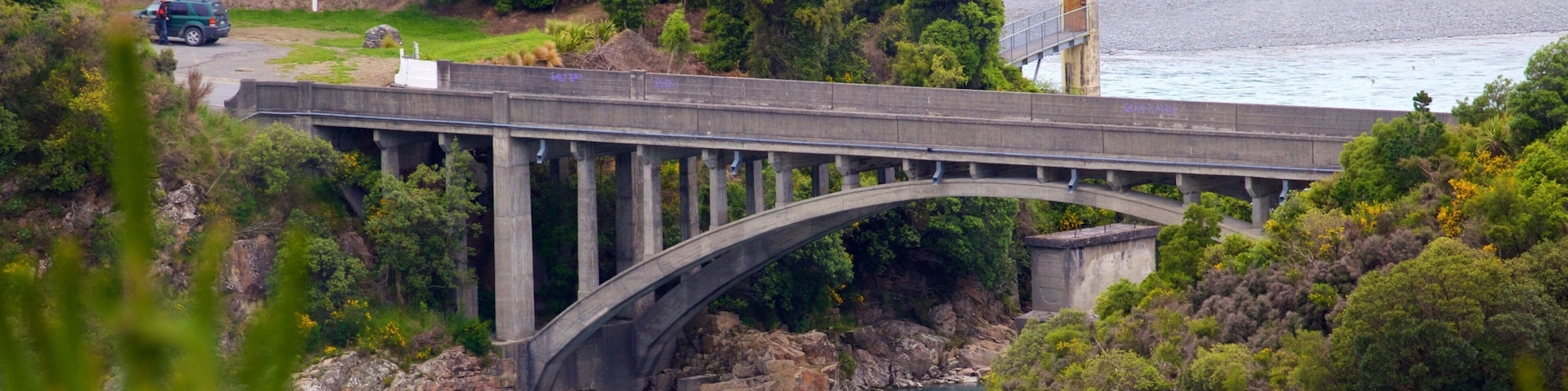 Rakaia Gorge featuring a bridge and a river or creek
