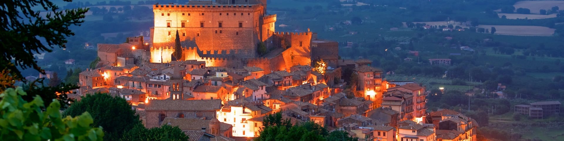 Soriano nel Cimino featuring night scenes, a city and heritage architecture