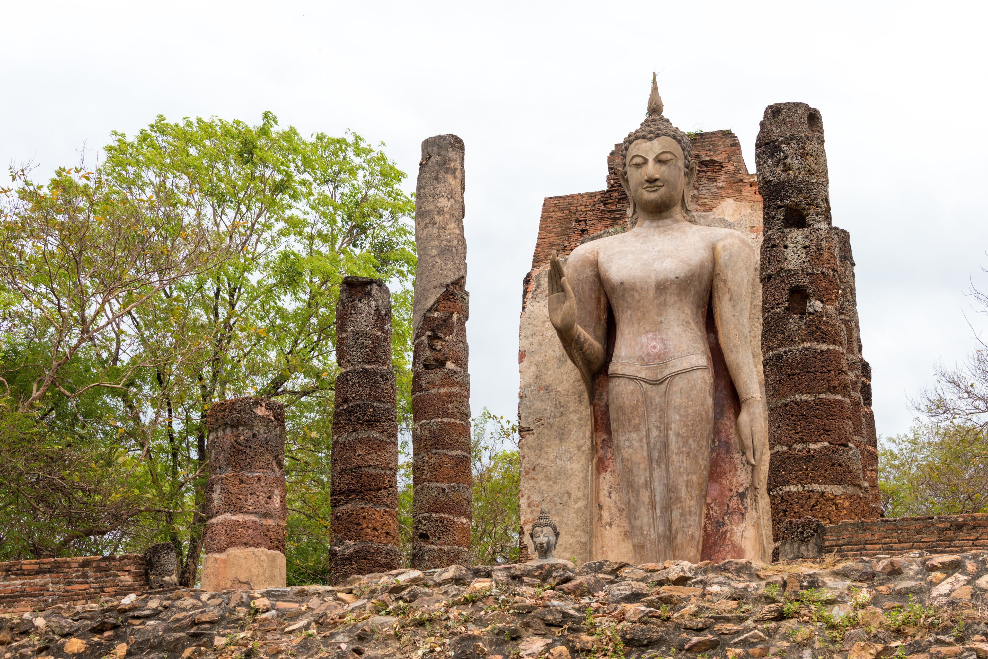 Sukhothai, Thailand - Apr 07 2018: Wat Saphan Hin in Sukhothai Historical Park, Sukhothai, Thailand. It is part of the World Heritage Site- Historic Town of Sukhothai and Associated Historic Towns.