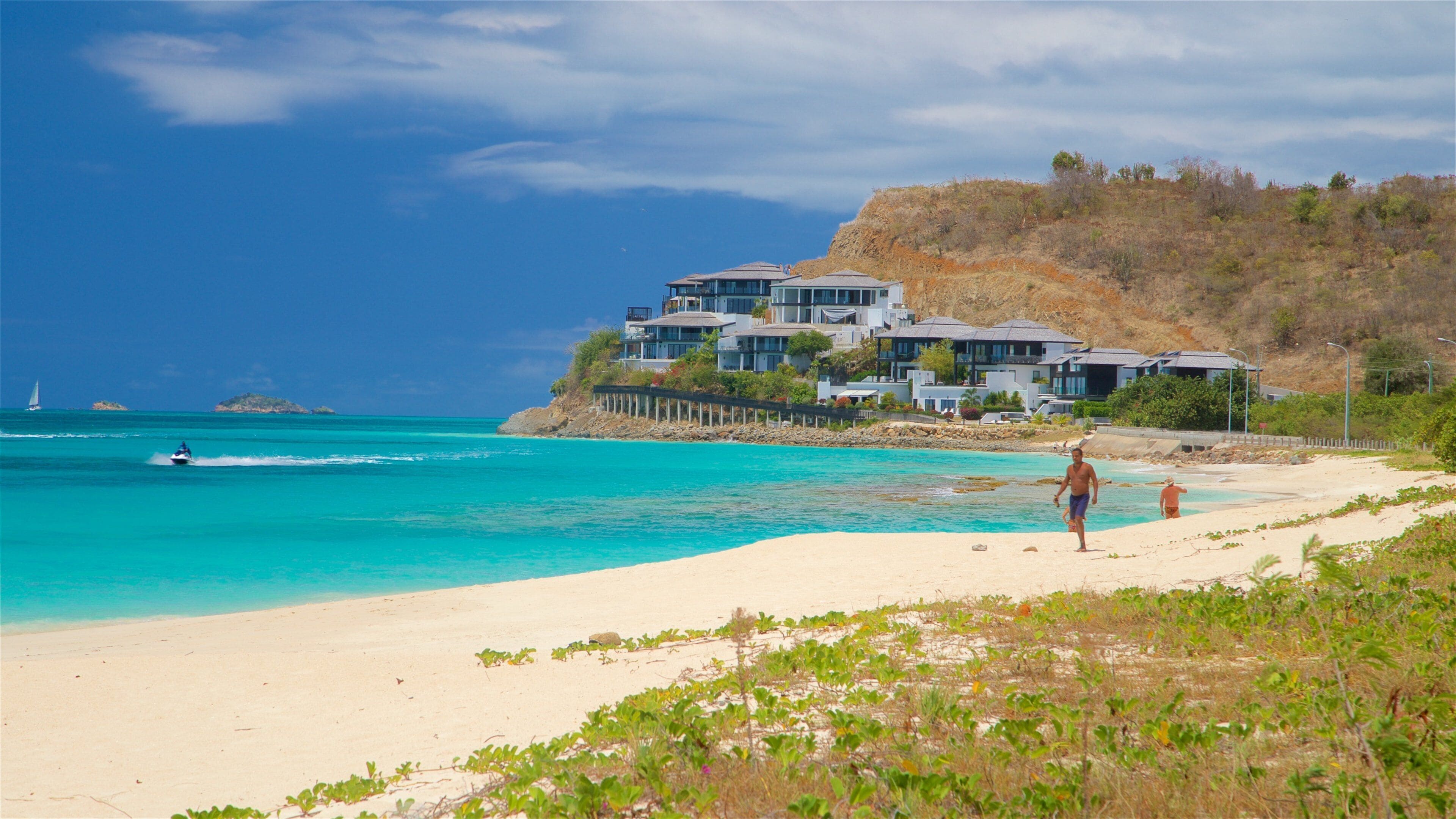 Darkwood Beach showing a beach, general coastal views and jet skiing