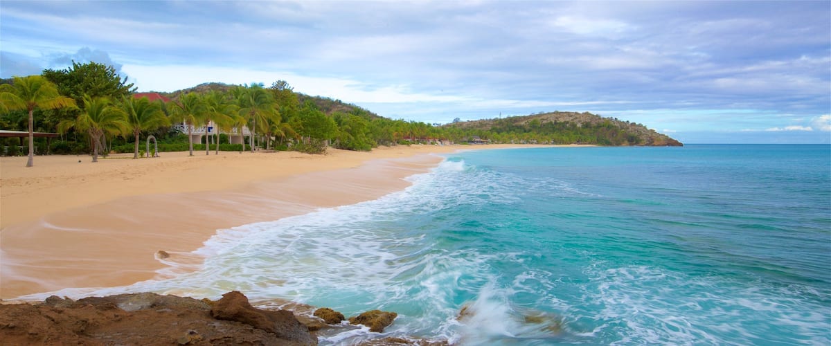 Galley Bay showing rugged coastline, general coastal views and a beach