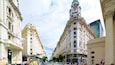 Plaza de Mayo featuring heritage architecture and a city