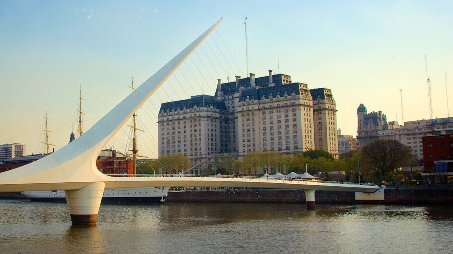 Women\'s Bridge featuring a bridge, a river or creek and modern architecture