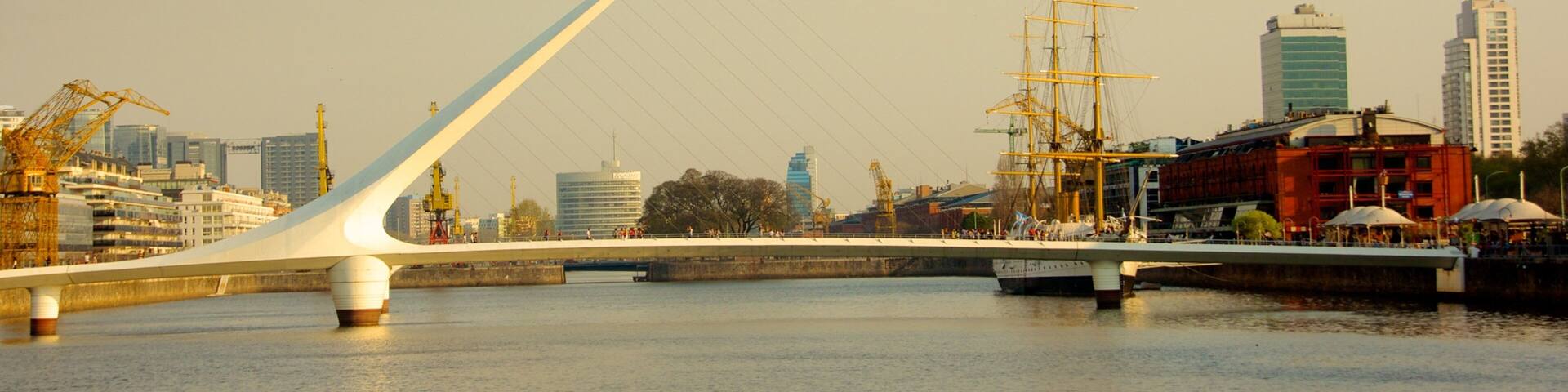 Women\'s Bridge showing modern architecture, a river or creek and a bridge