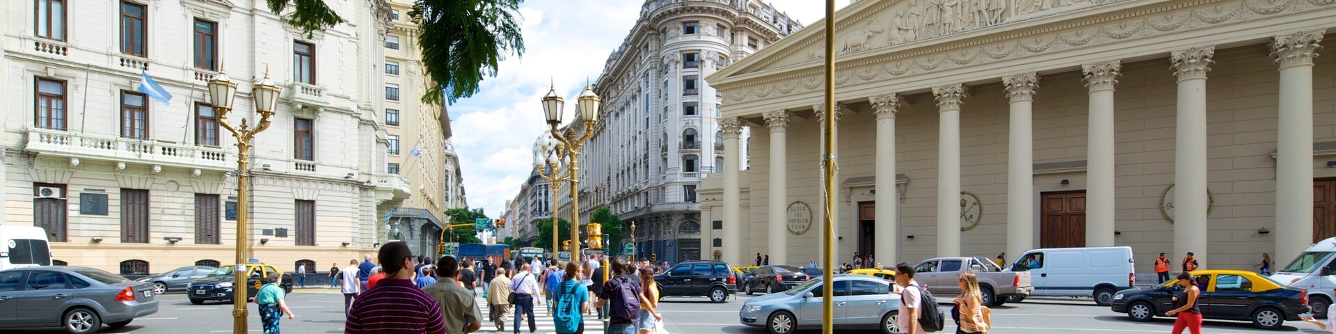 Buenos Aires Metropolitan Cathedral featuring heritage architecture as well as a large group of people