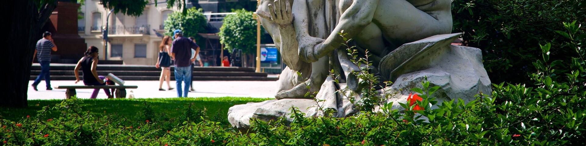 Plaza San Martin featuring a garden and a statue or sculpture