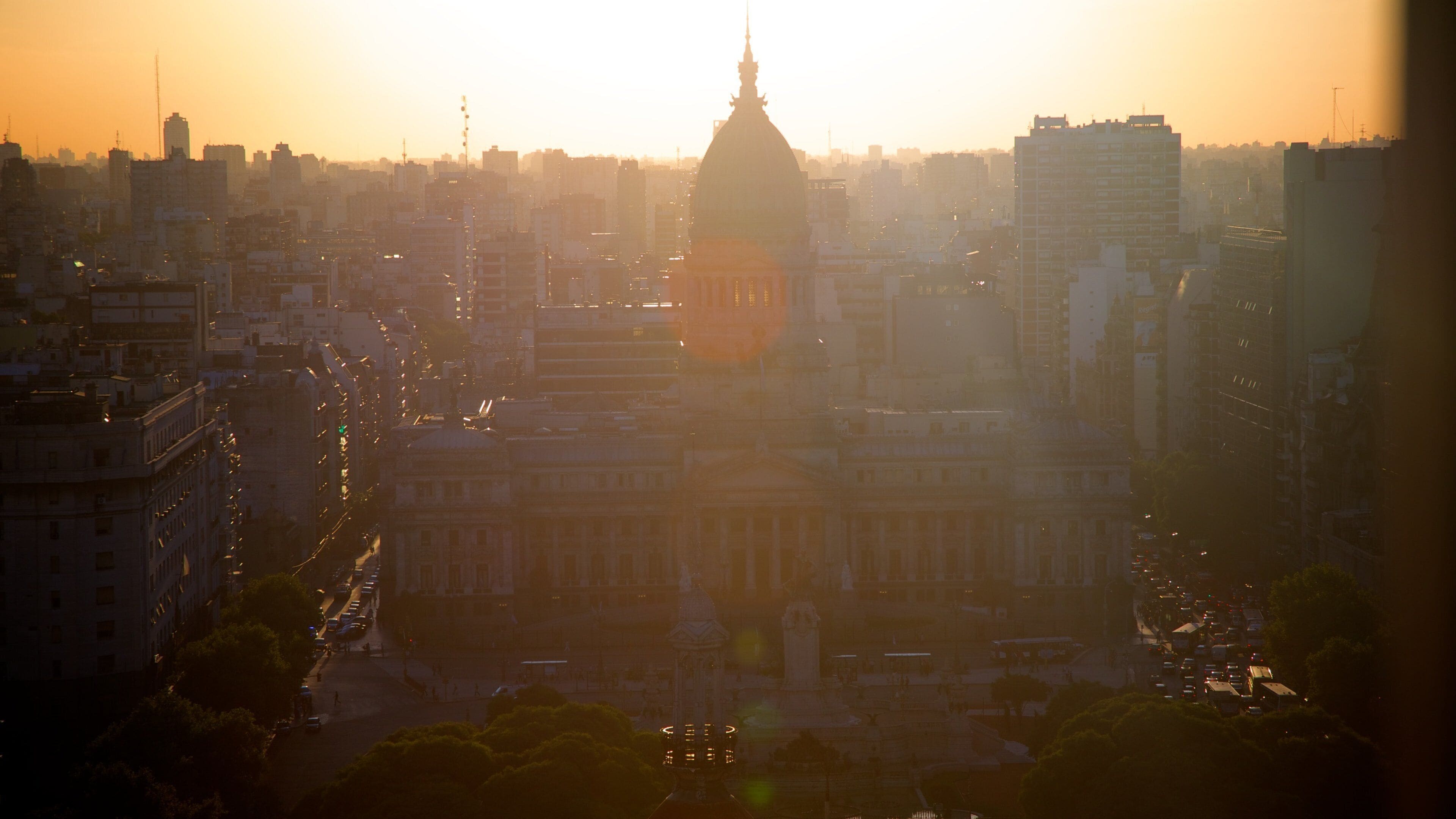Edificio Barolo featuring a sunset and a city