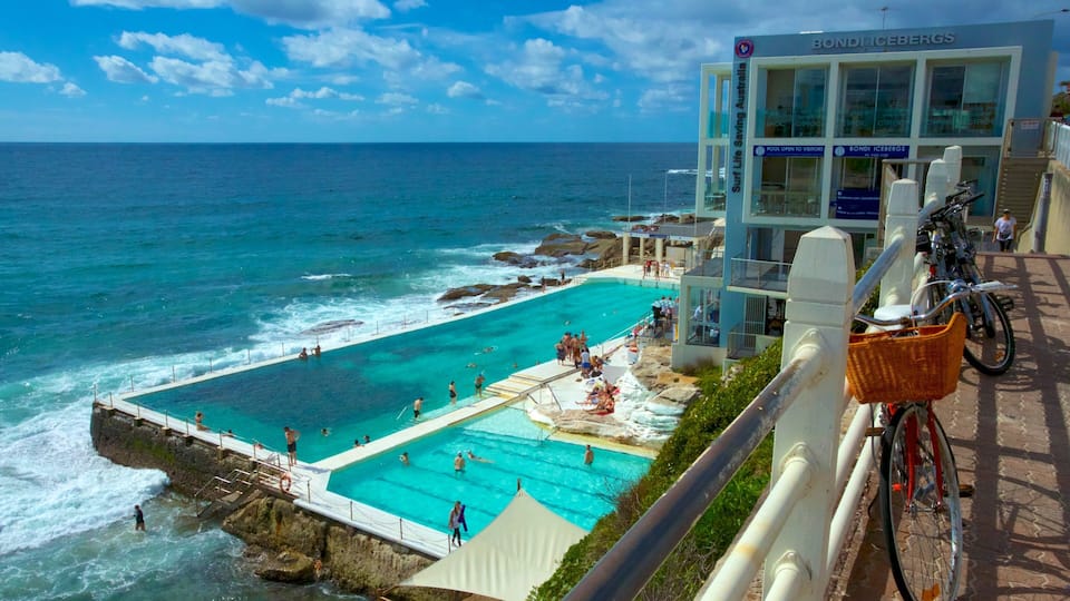 Bondi Beach showing swimming, general coastal views and a pool