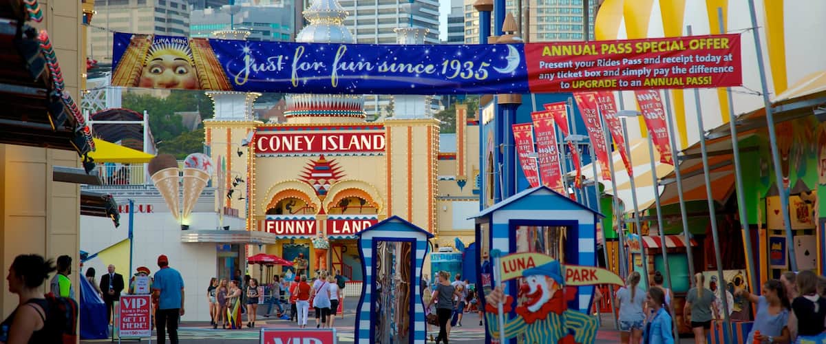A vibrant amusement park with a prominent sign for 'Coney Island' and 'Luna Park'.