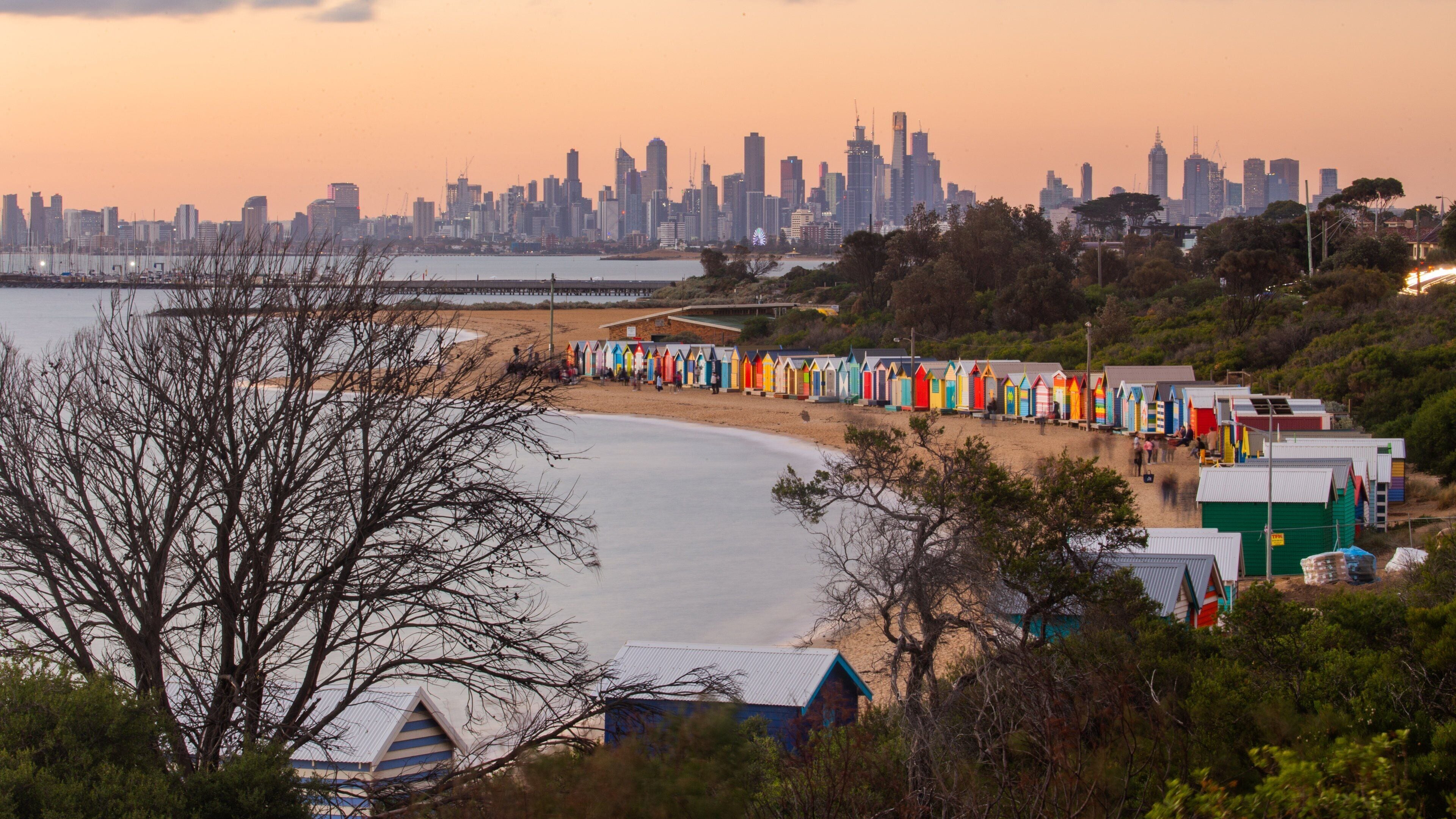 Brighton Beach featuring landscape views, a sunset and a beach