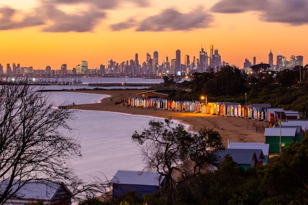 Brighton Beach featuring a city, a sunset and a beach
