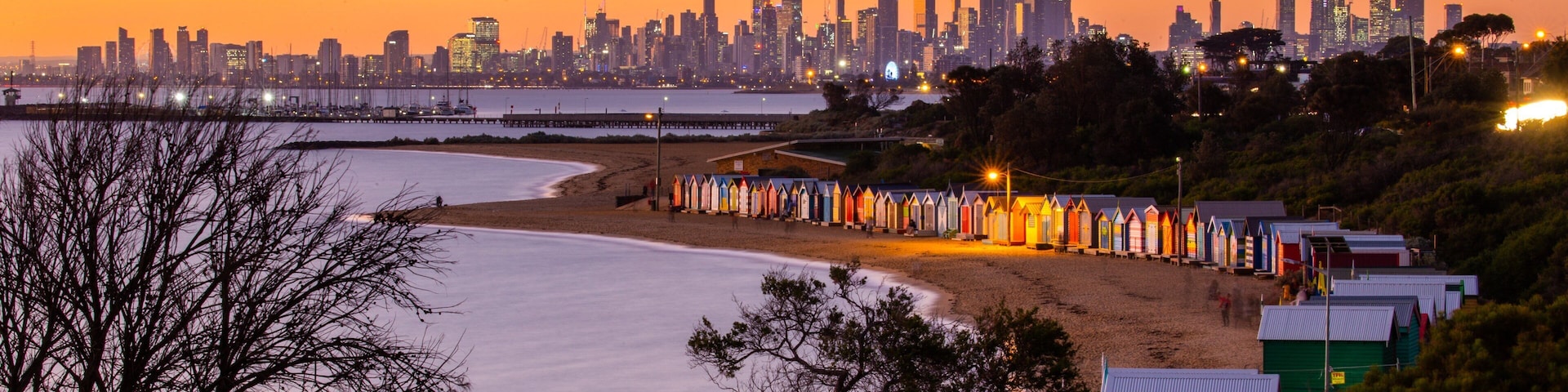 Brighton Beach featuring a city, a sunset and a beach