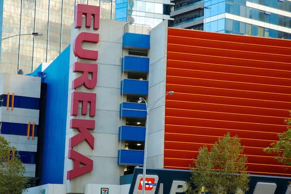 Eureka Tower which includes signage, a city and modern architecture