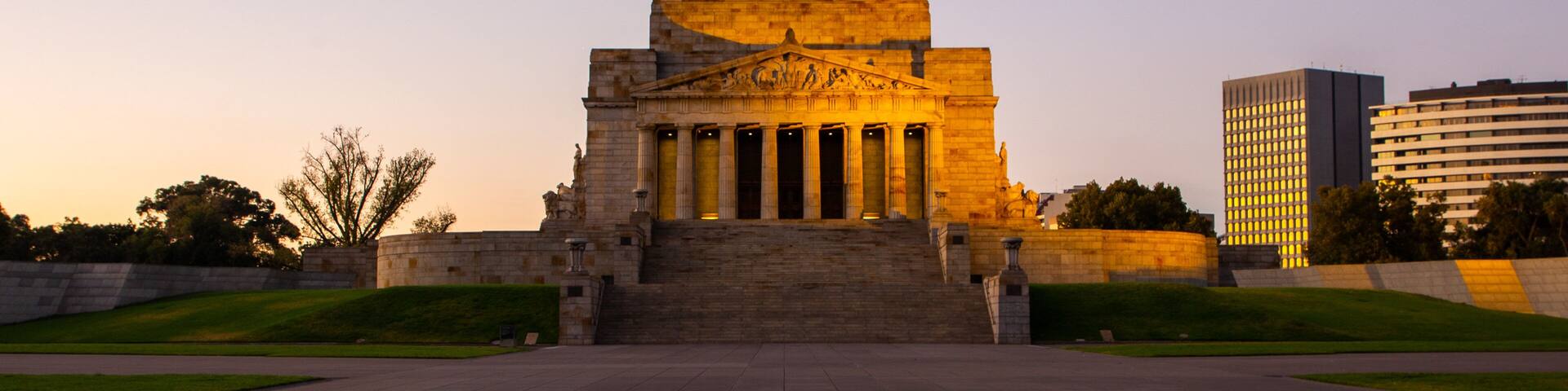 Shrine of Remembrance which includes a sunset and heritage architecture