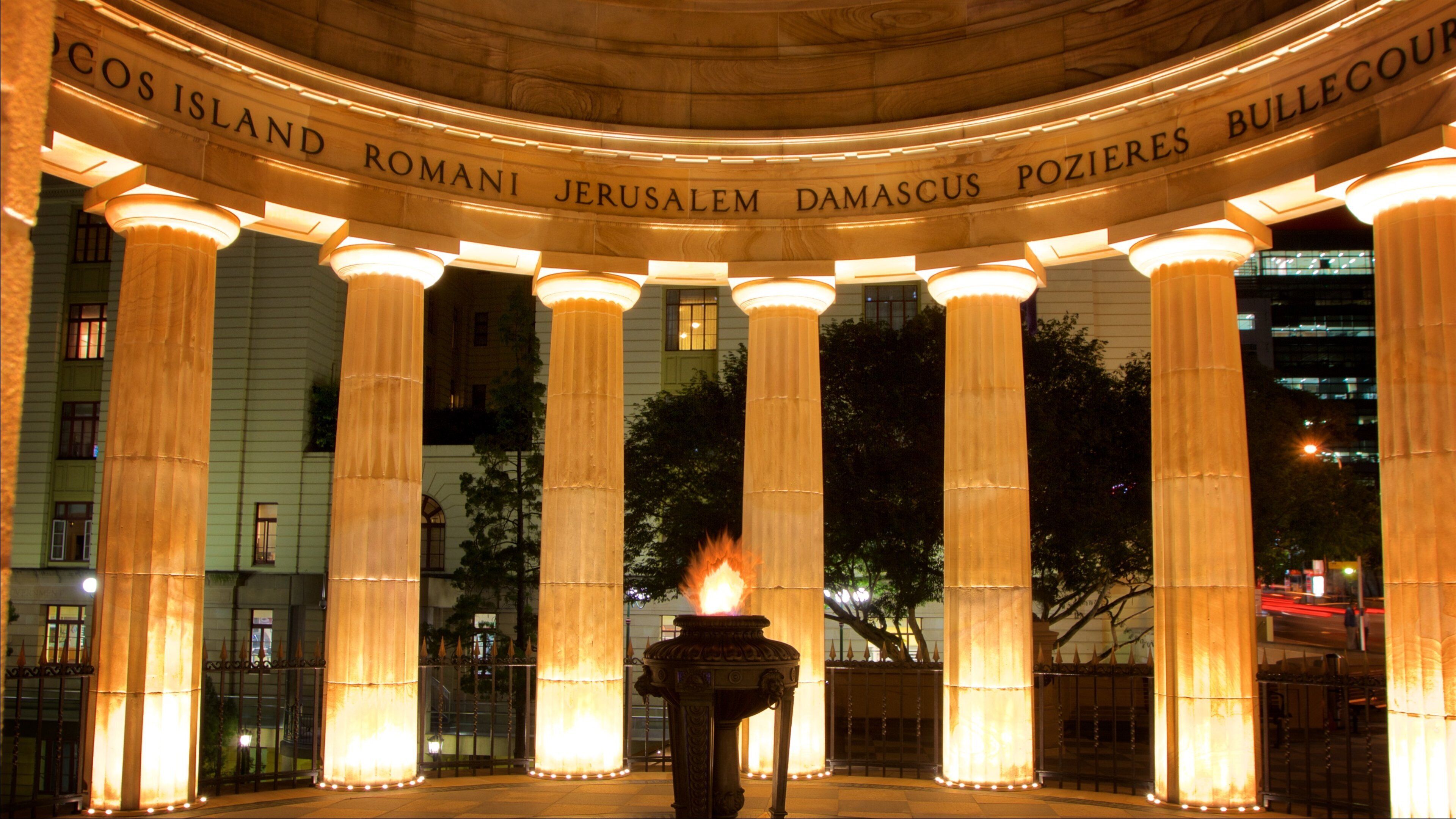 ANZAC Square War Memorial featuring signage and a city