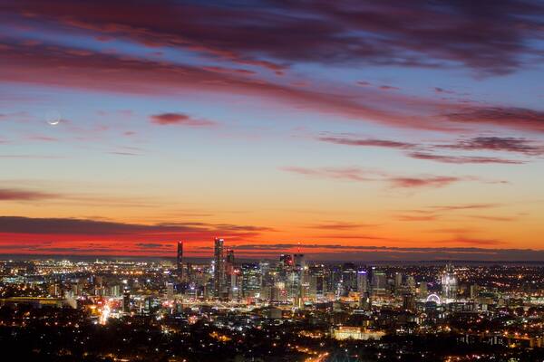 Mt. Coot-Tha which includes central business district, a sunset and night scenes