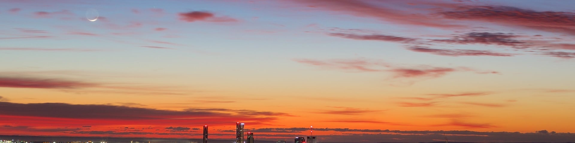 Mt. Coot-Tha which includes central business district, a sunset and night scenes