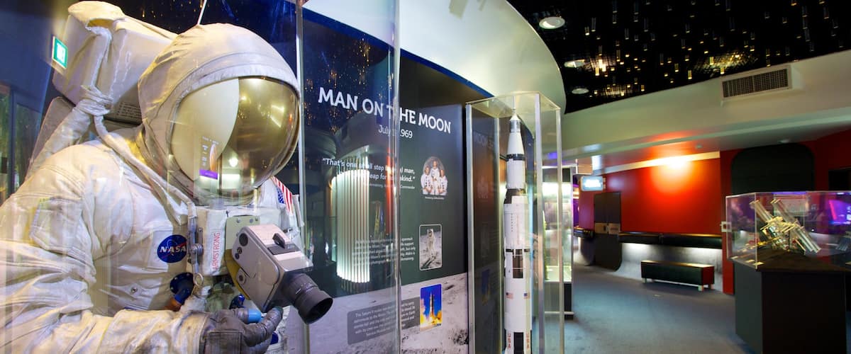 Sir Thomas Brisbane Planetarium which includes an observatory, signage and interior views