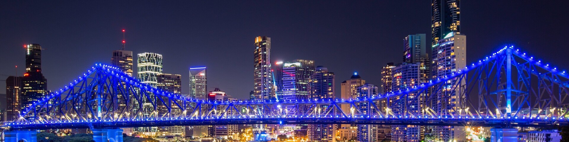 Story Bridge featuring a bridge, night scenes and a river or creek