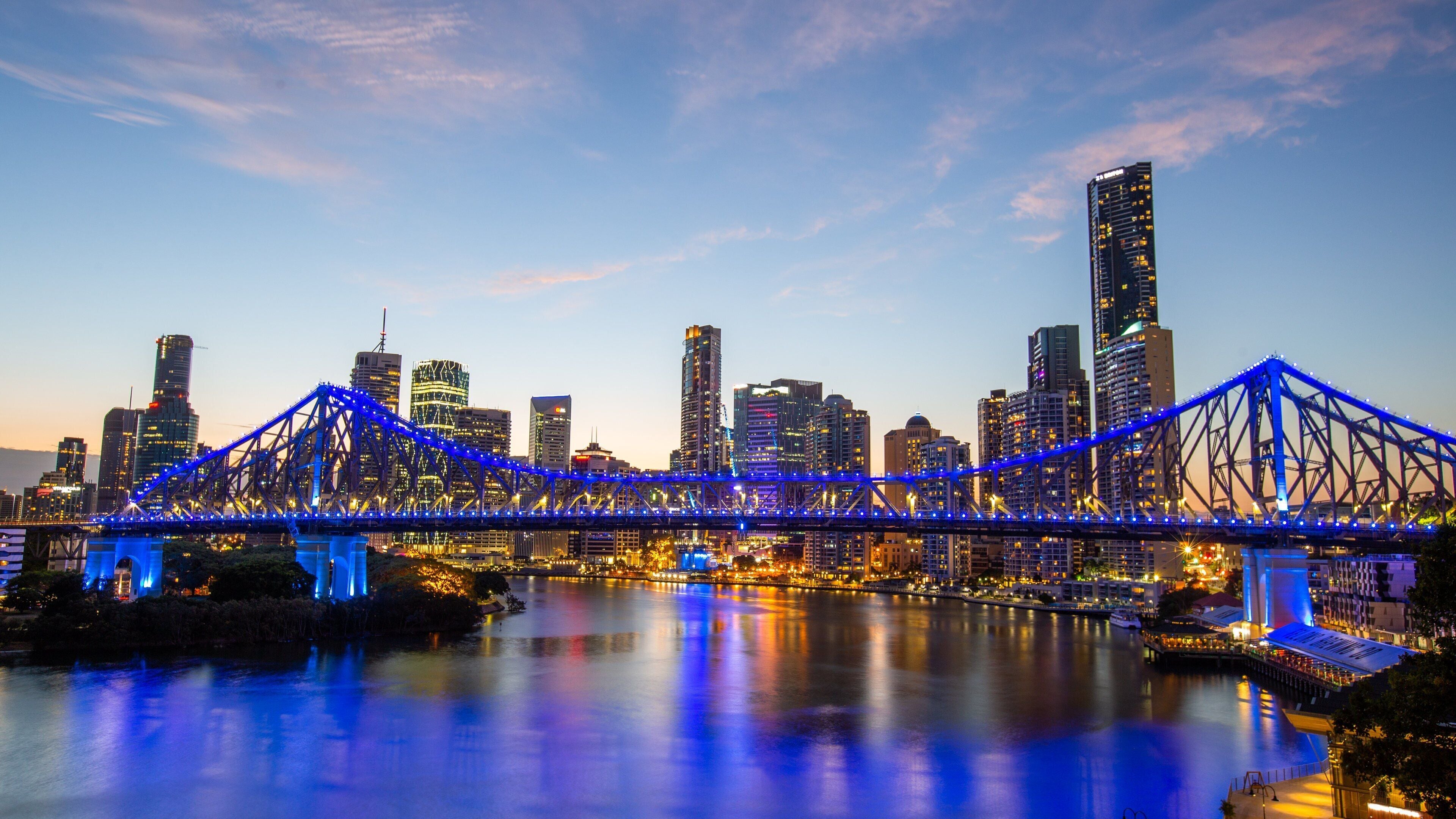 Story Bridge featuring a city, a river or creek and a bridge