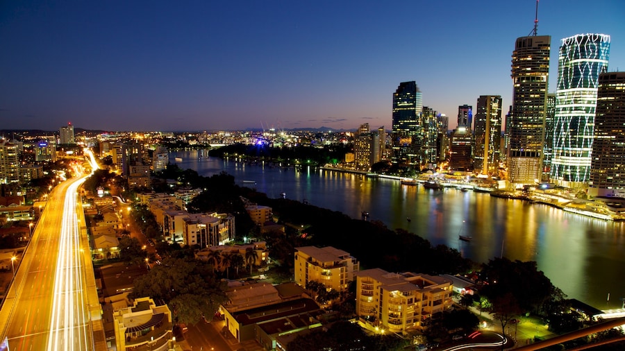 Story Bridge which includes modern architecture, night scenes and cbd
