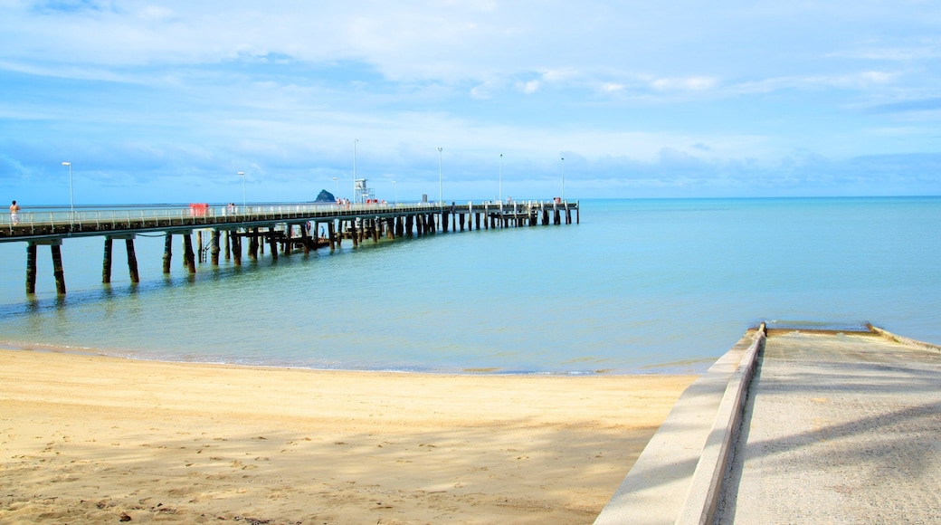 Palm Cove Beach which includes skyline, a sandy beach and landscape views