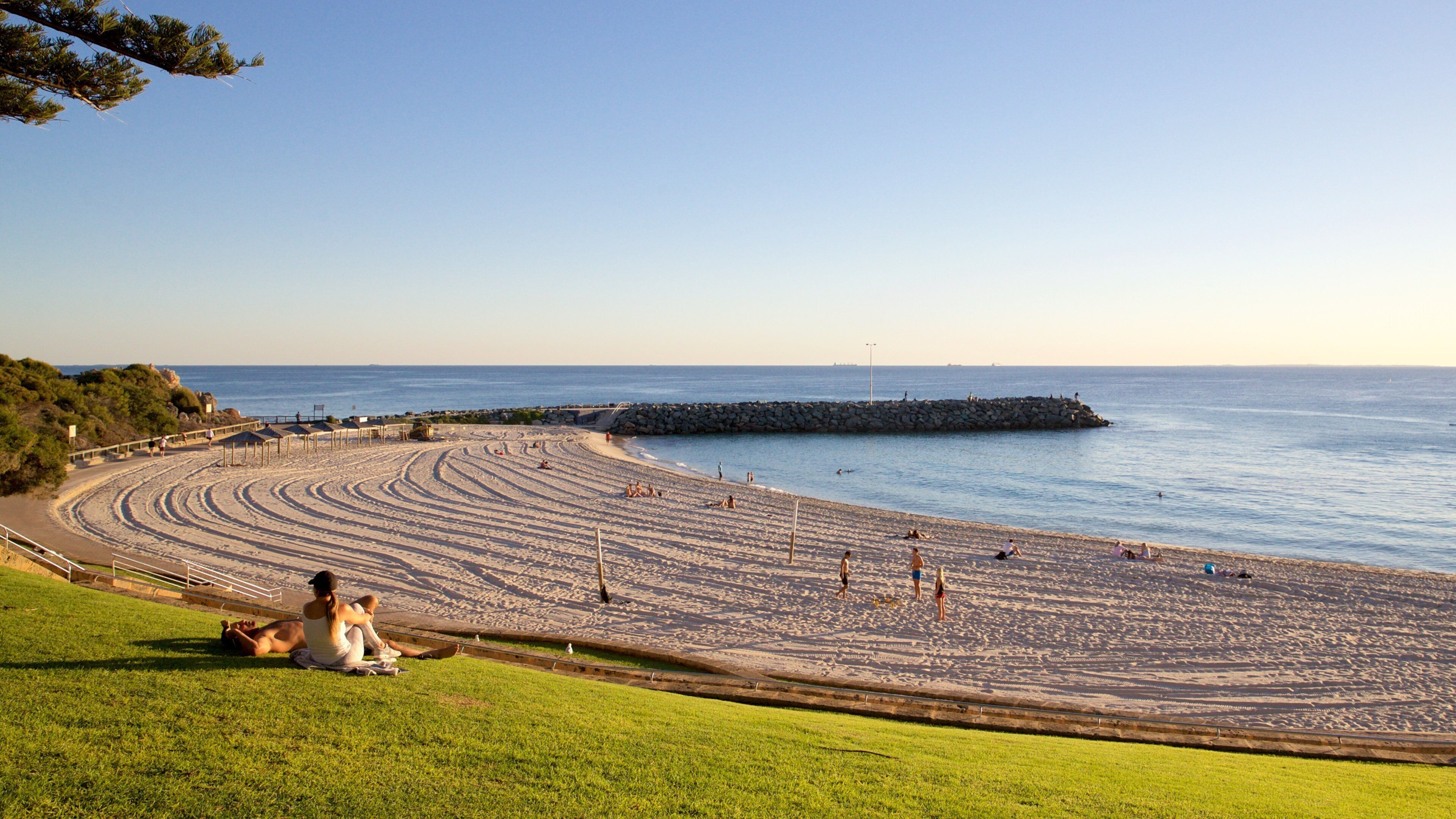 Cottesloe Beach which includes a sunset, general coastal views and a beach