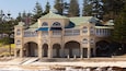 Cottesloe Beach which includes a sandy beach and a coastal town