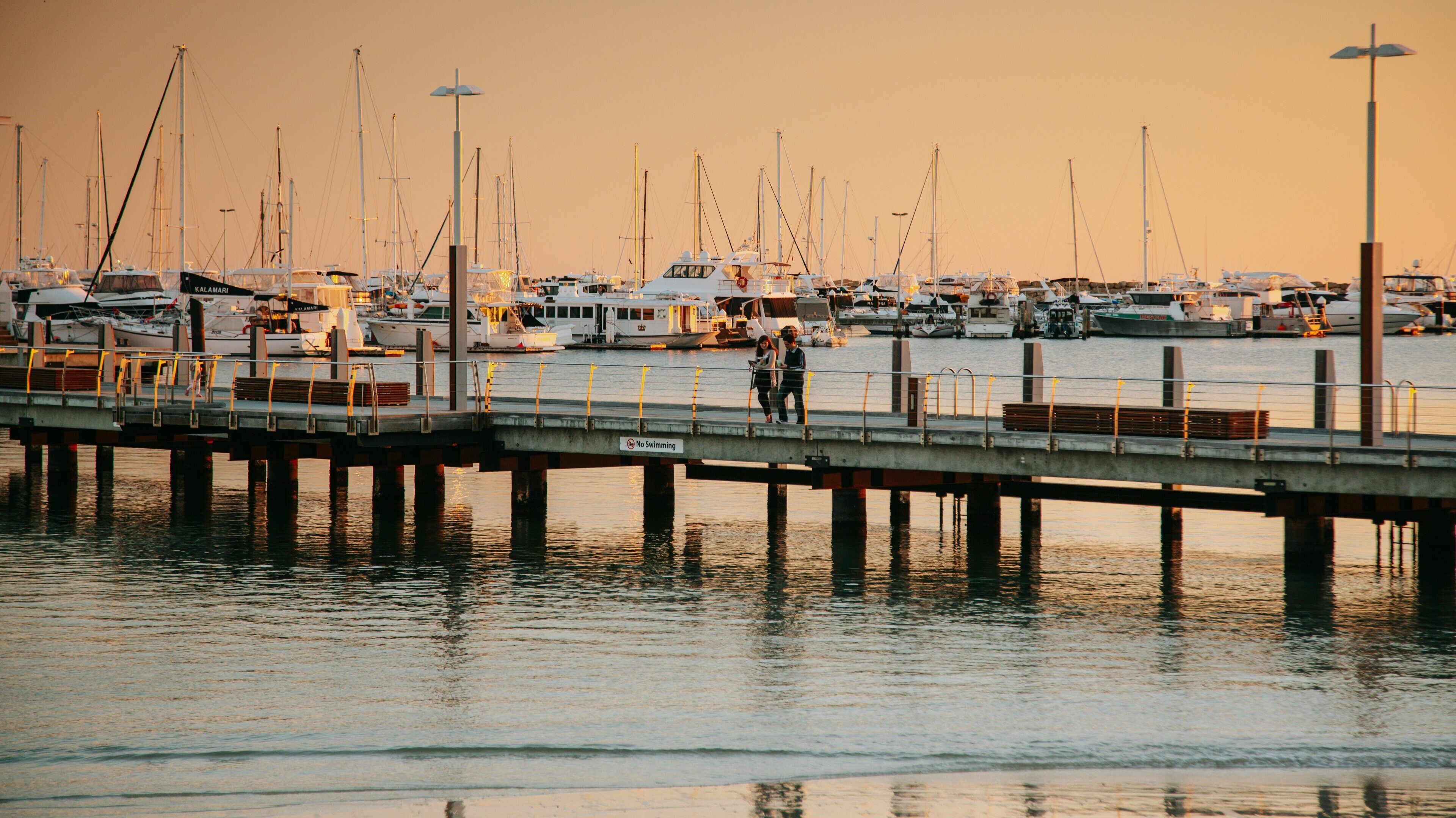 Hillarys Boat Harbour which includes a sunset and a bay or harbor