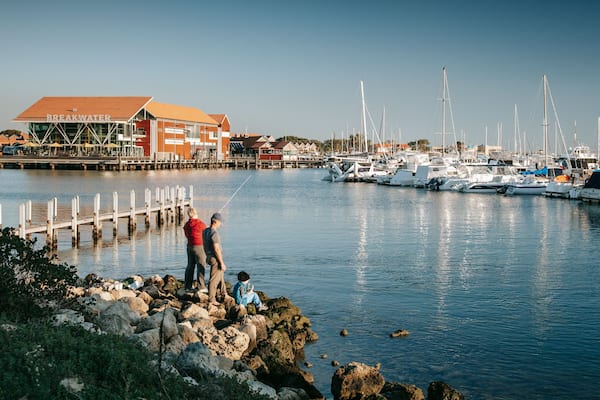 Hillarys Boat Harbour featuring a bay or harbor and fishing as well as a family