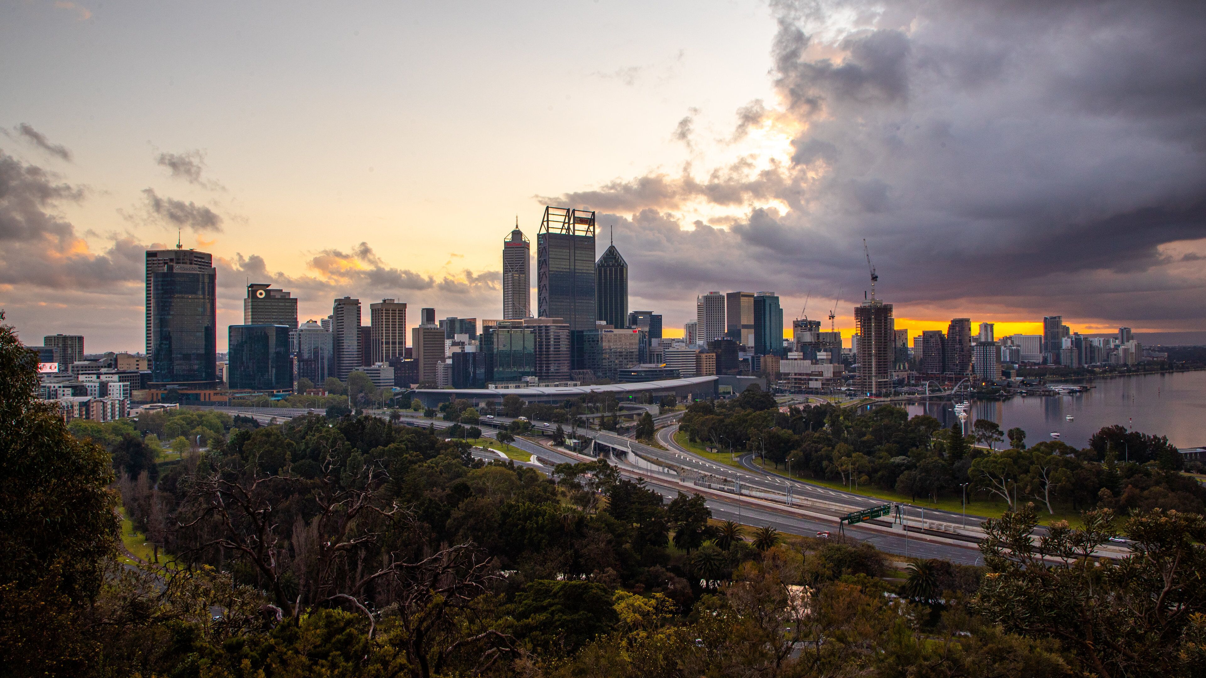 Kings Park and Botanic Garden showing landscape views, a sunset and a city