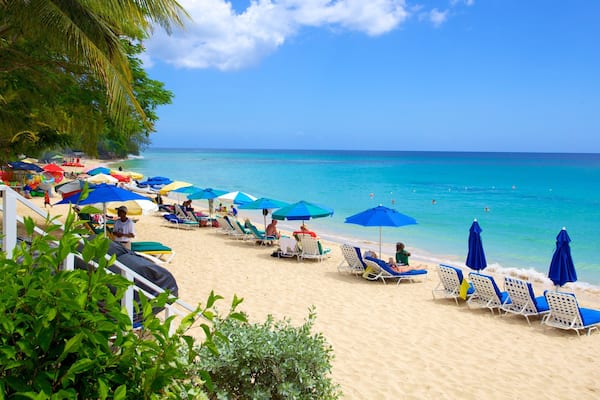 Mullins Beach which includes tropical scenes and a sandy beach