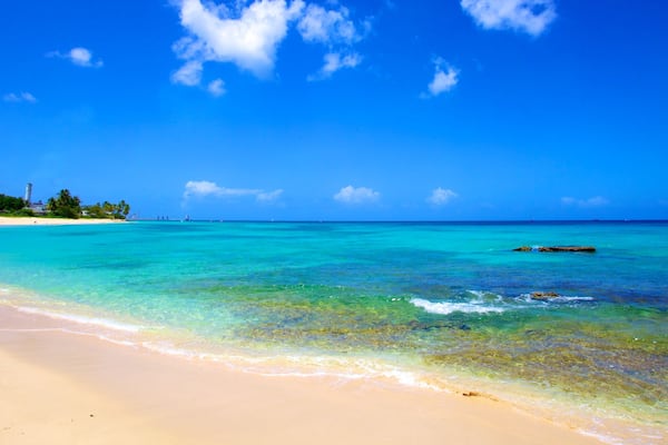 Paradise Beach featuring tropical scenes, landscape views and a beach