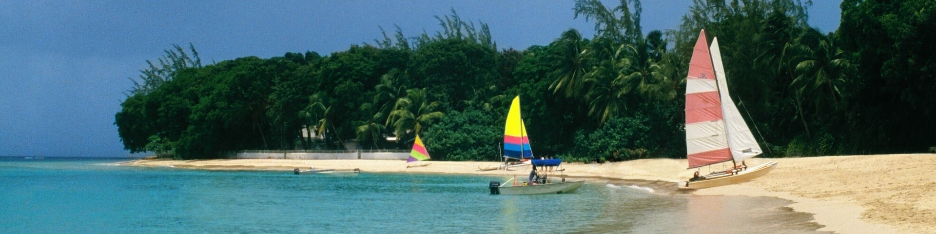 Sail boats are seen at a seashore near Sandy Lane Hotel Beach, Barbados, Caribbean